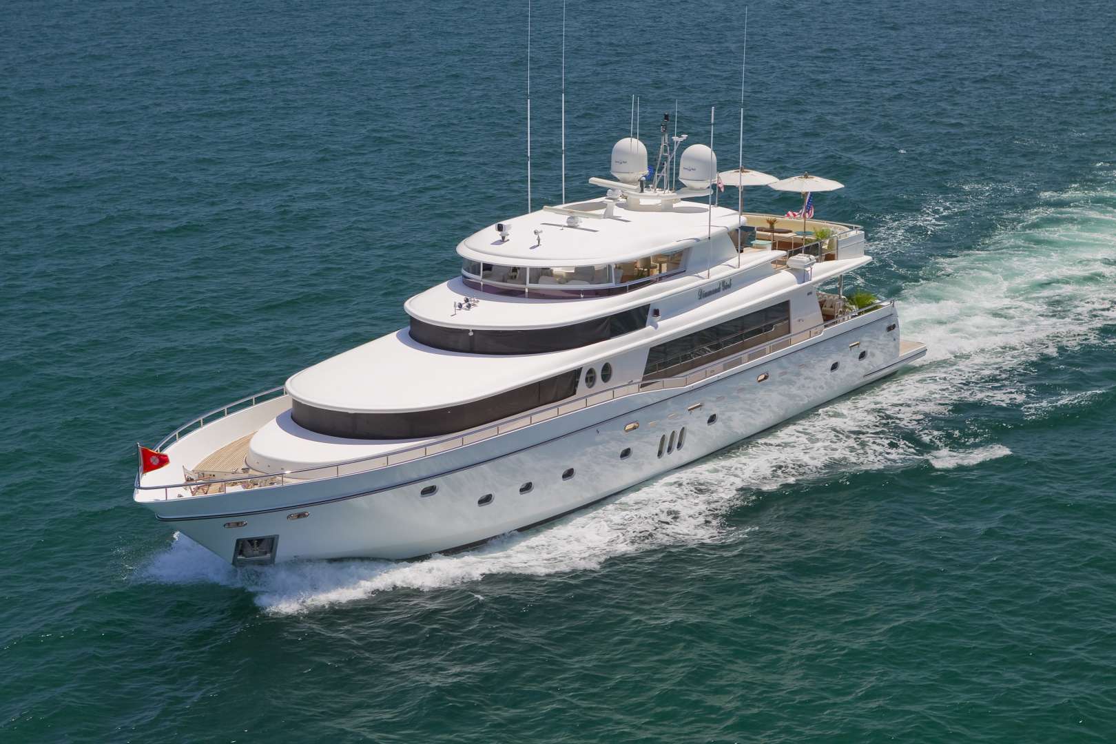 Stunning 2696 yacht with multi-deck design at sea.