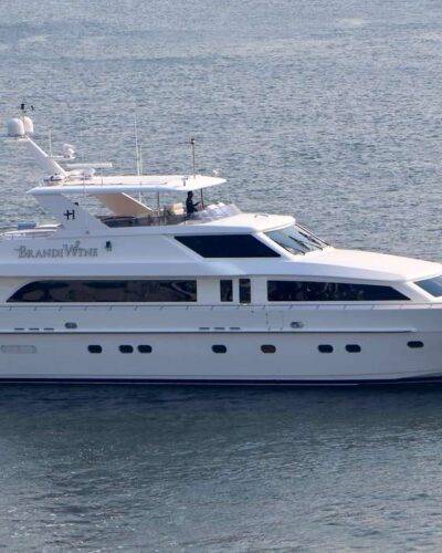 Powerful 6596 superyacht sailing on sunny day.