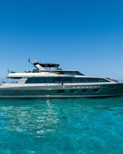 Sleek 7645 yacht, contemporary lines on calm ocean.