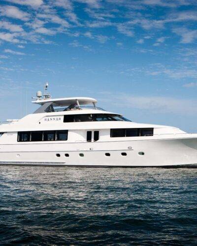 Spacious 8080 luxury yacht with outdoor dining area.