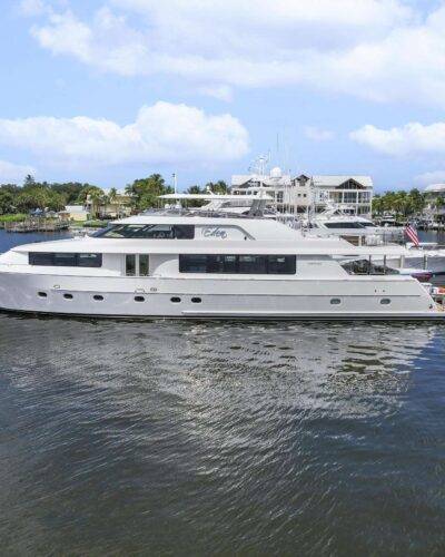 Modern luxury yacht interior with stylish lounge and dining space