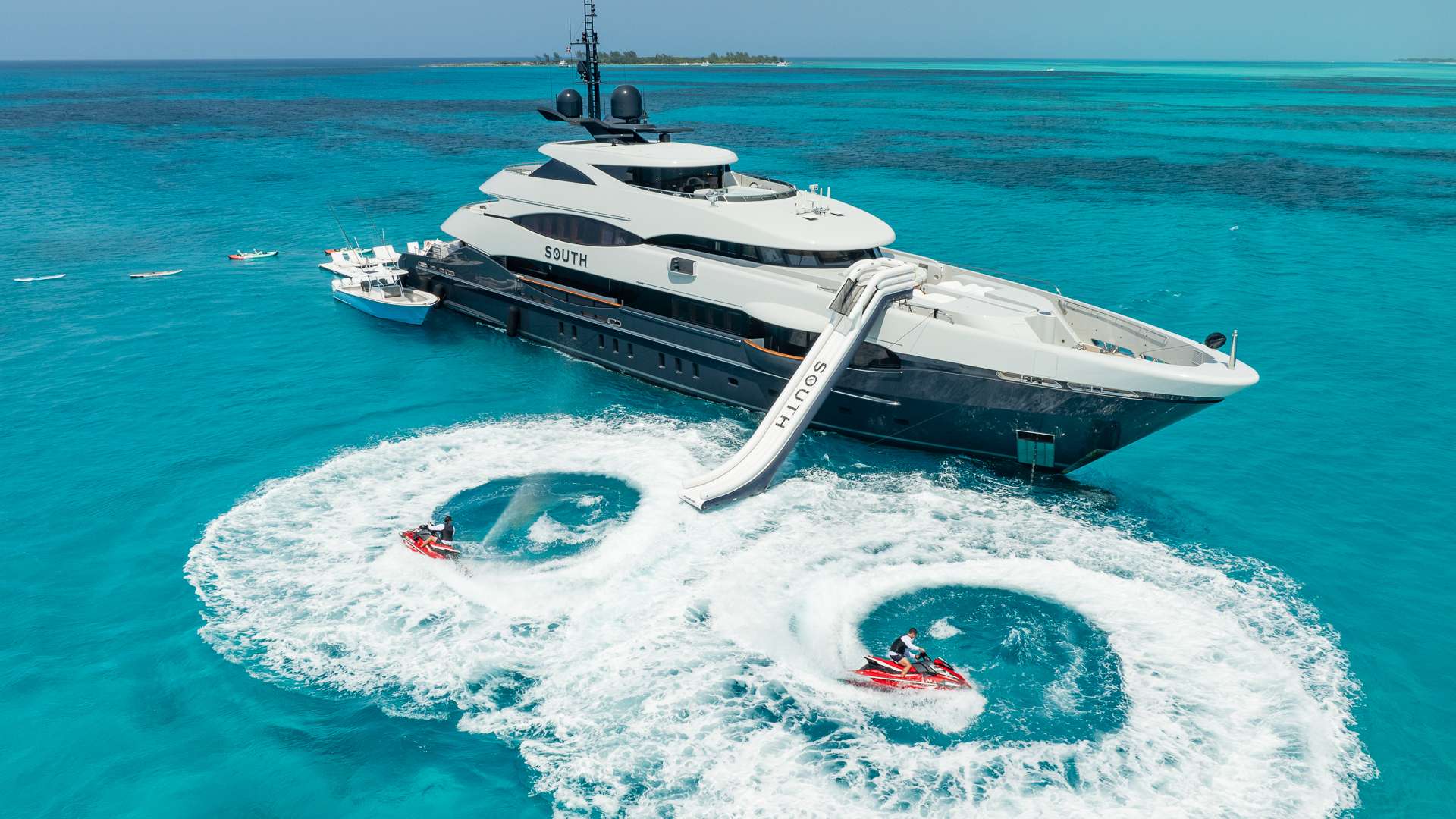 Modern 9261 yacht, sleek design against blue sky.
