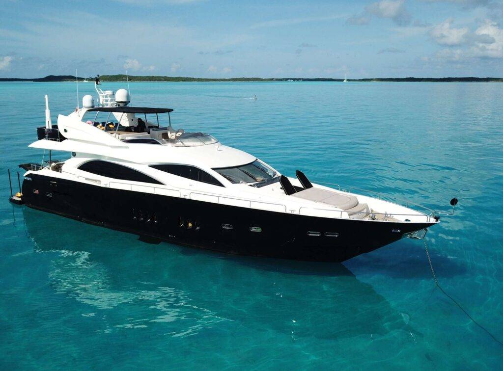 Contemporary 7971 yacht in open water, blue skies.